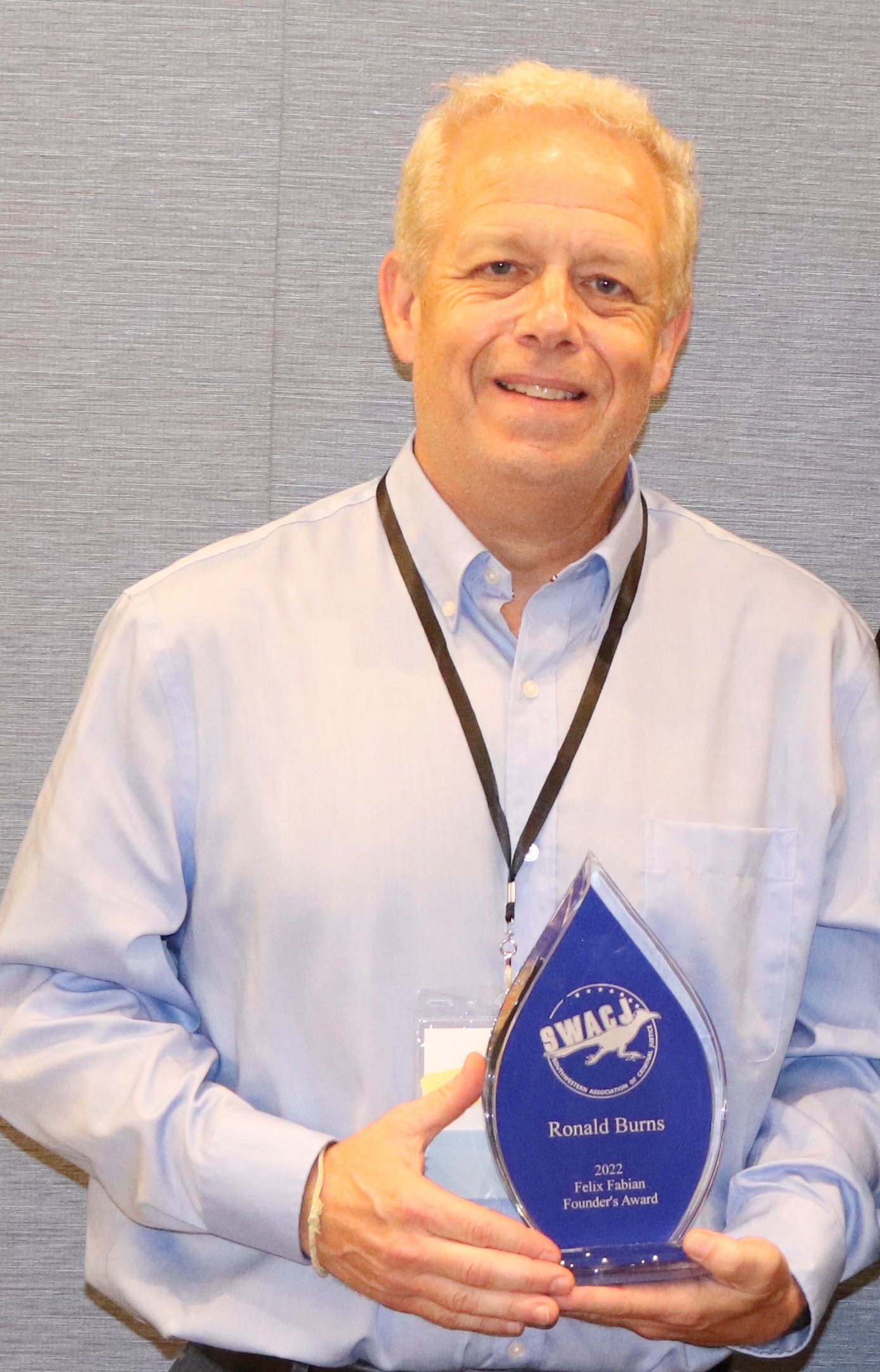 Photo of Chip Burns with Award