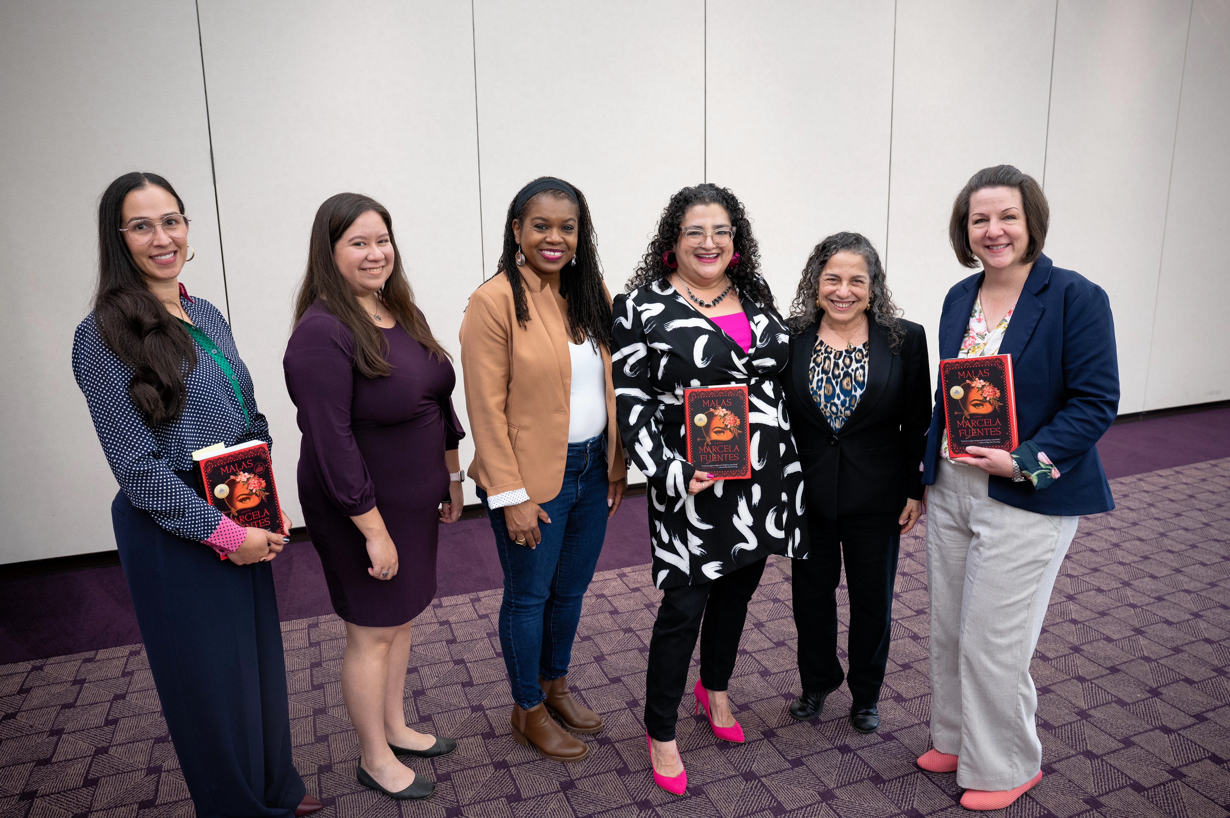 Marcela Fuentes with panel speakers