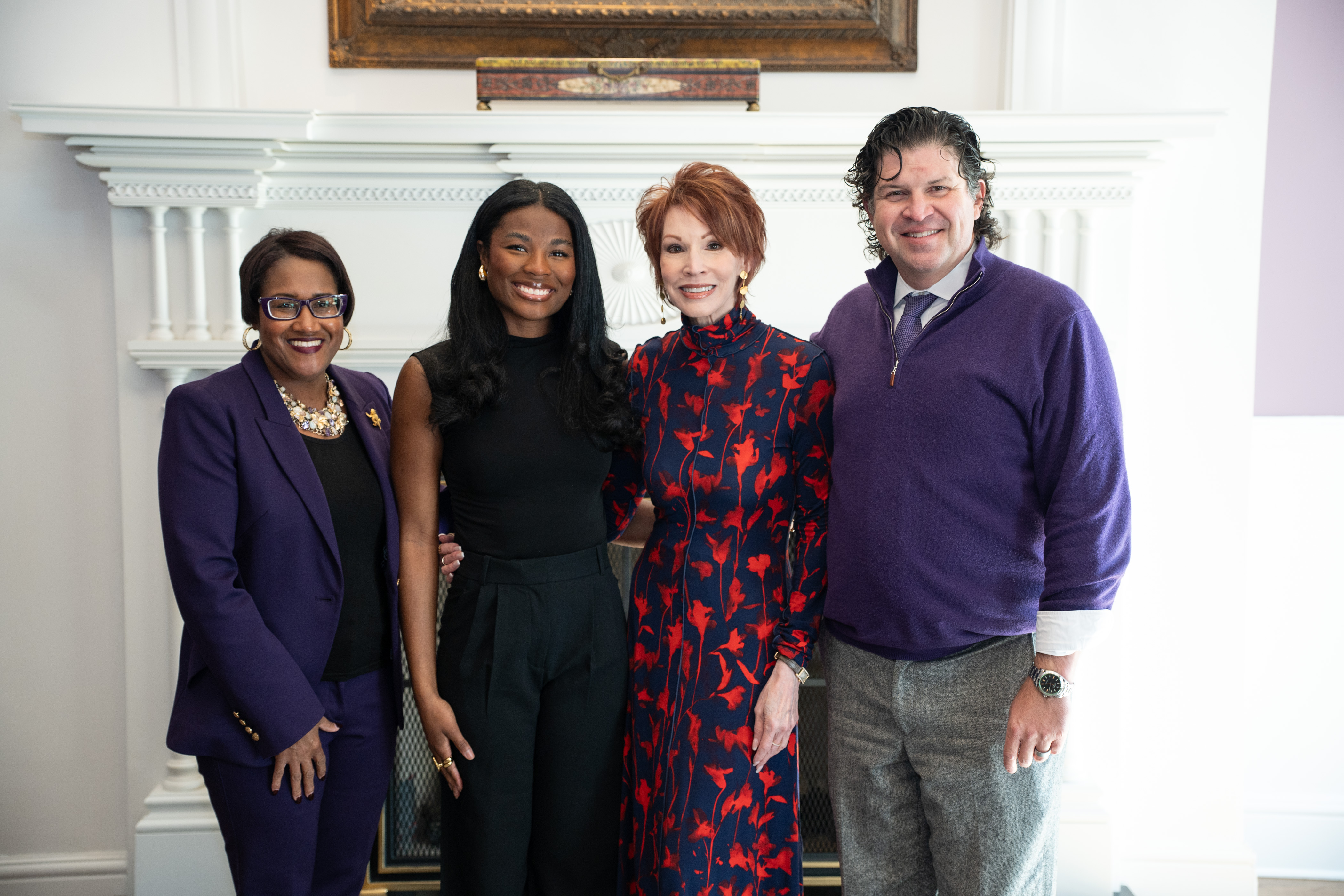 Grace Conley posing with Dean Watson, Sandra Brown, and Chancellor Pullin