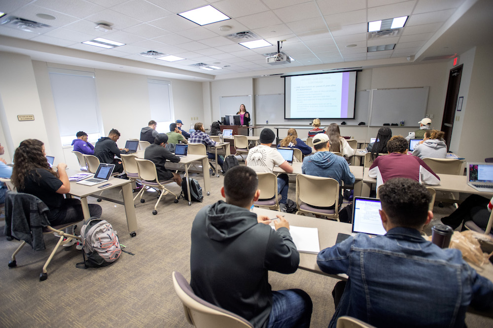 Students in a classroom in Scharbauer Hall