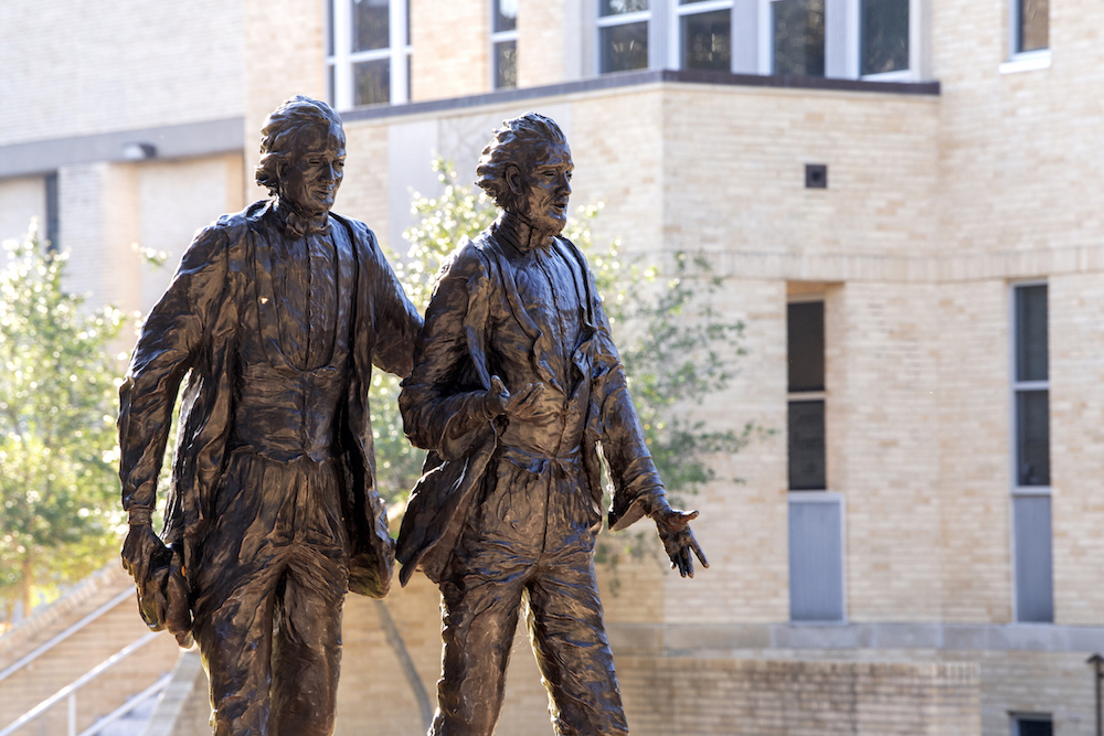 A statue of TCU founders Addison and Randolph Clark