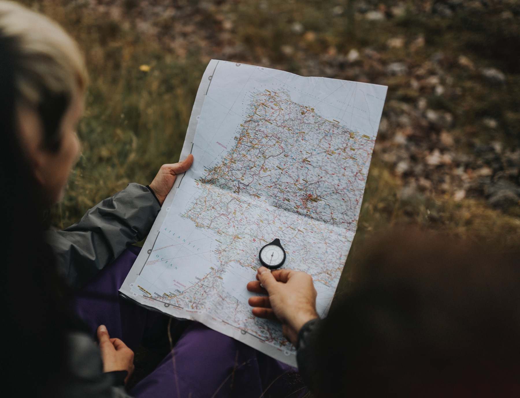 A person examines a map