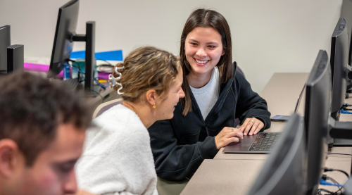Students discuss coursework during a Scope & Methods of Political Science class led by professor and chair of political science Michael Strausz.