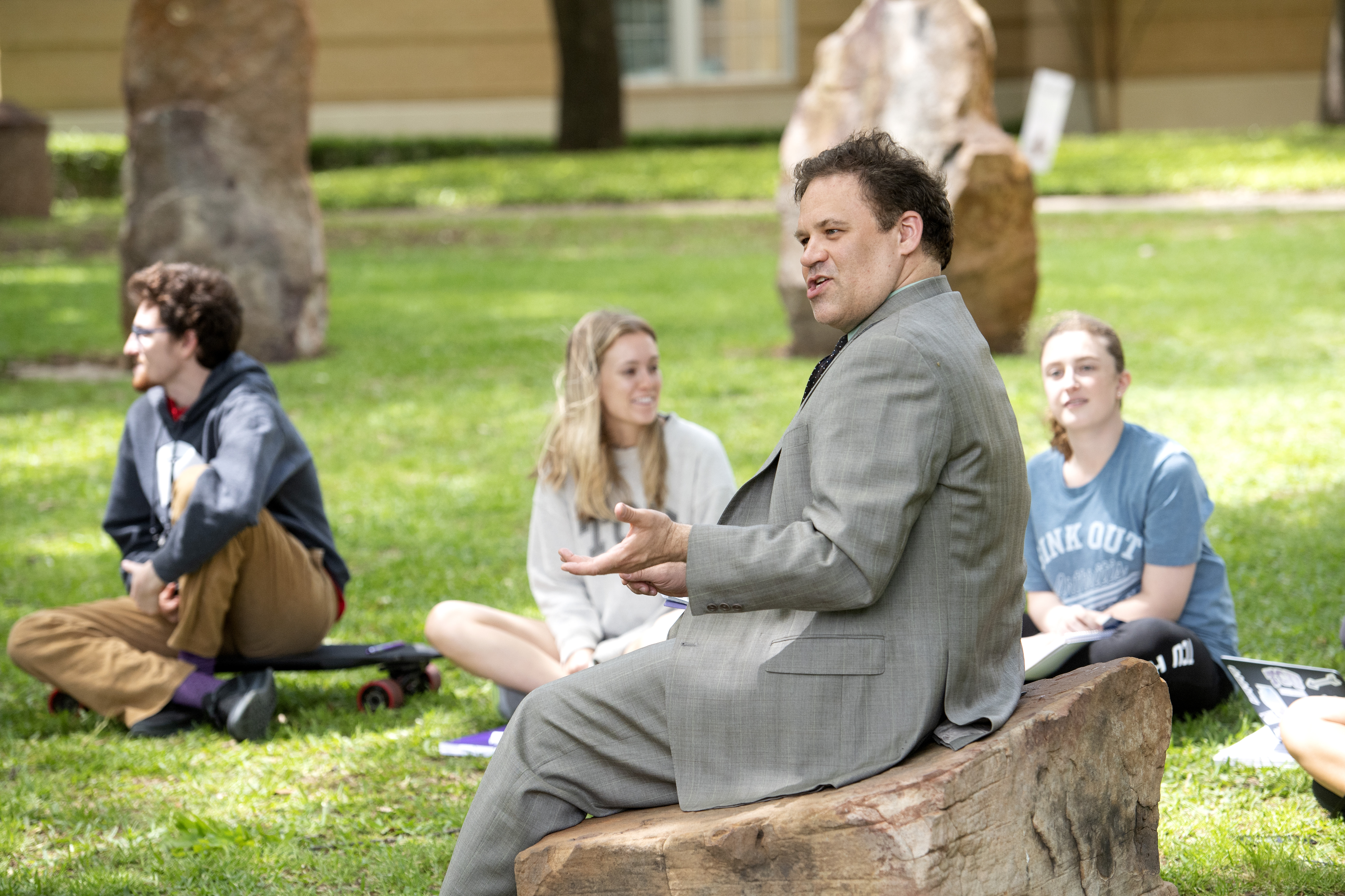 Matthew Pitt, Ph.D., speaks with students outside the College of Education in 2018. Credit TCU Marketing & Communication | photo by Jeffrey McWhorter