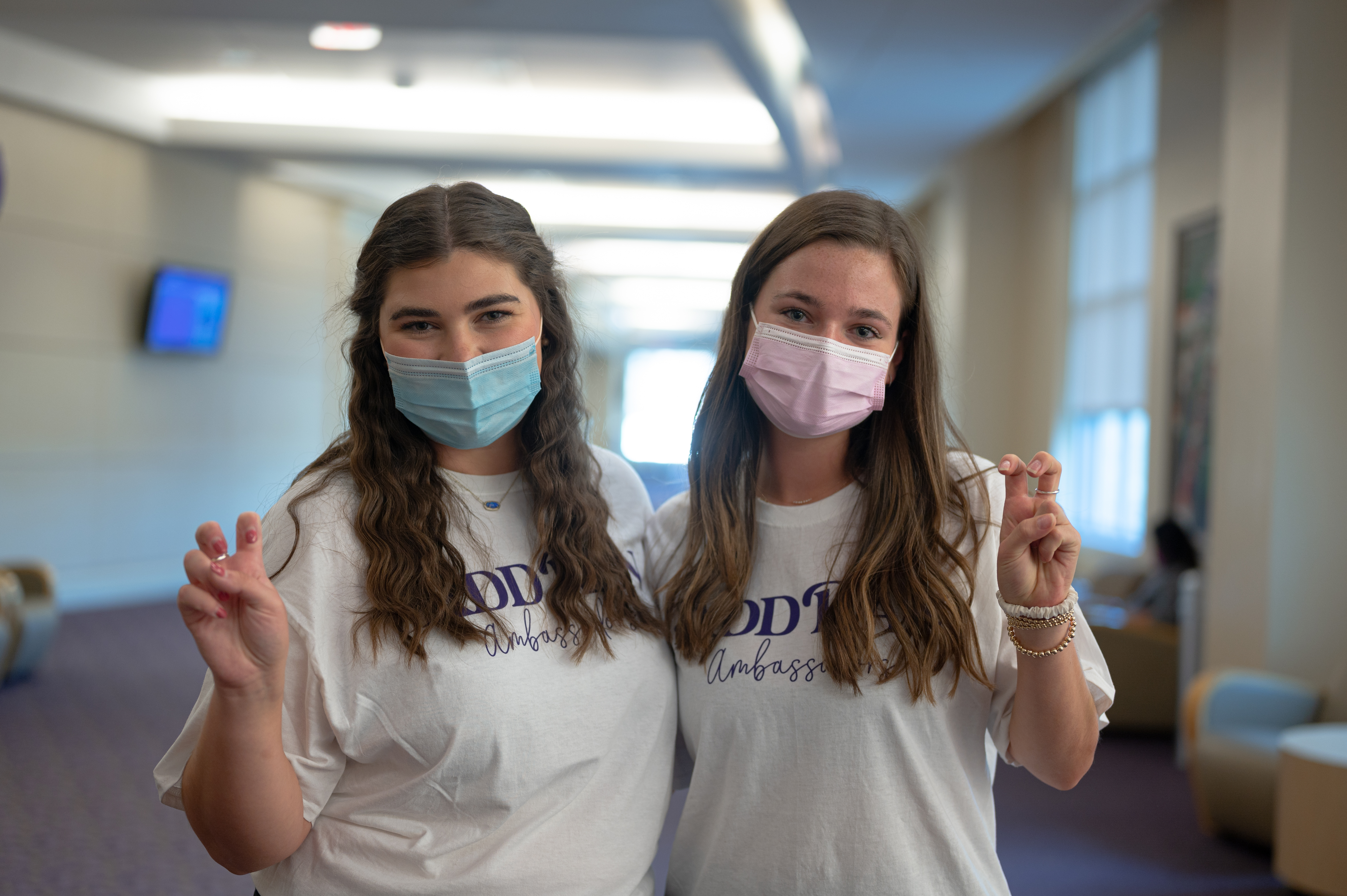 Rowland (right) stands with another AddRan Ambassador at the AddRan Ambassadors' Retreat earlier in the fall 2021 semester. 