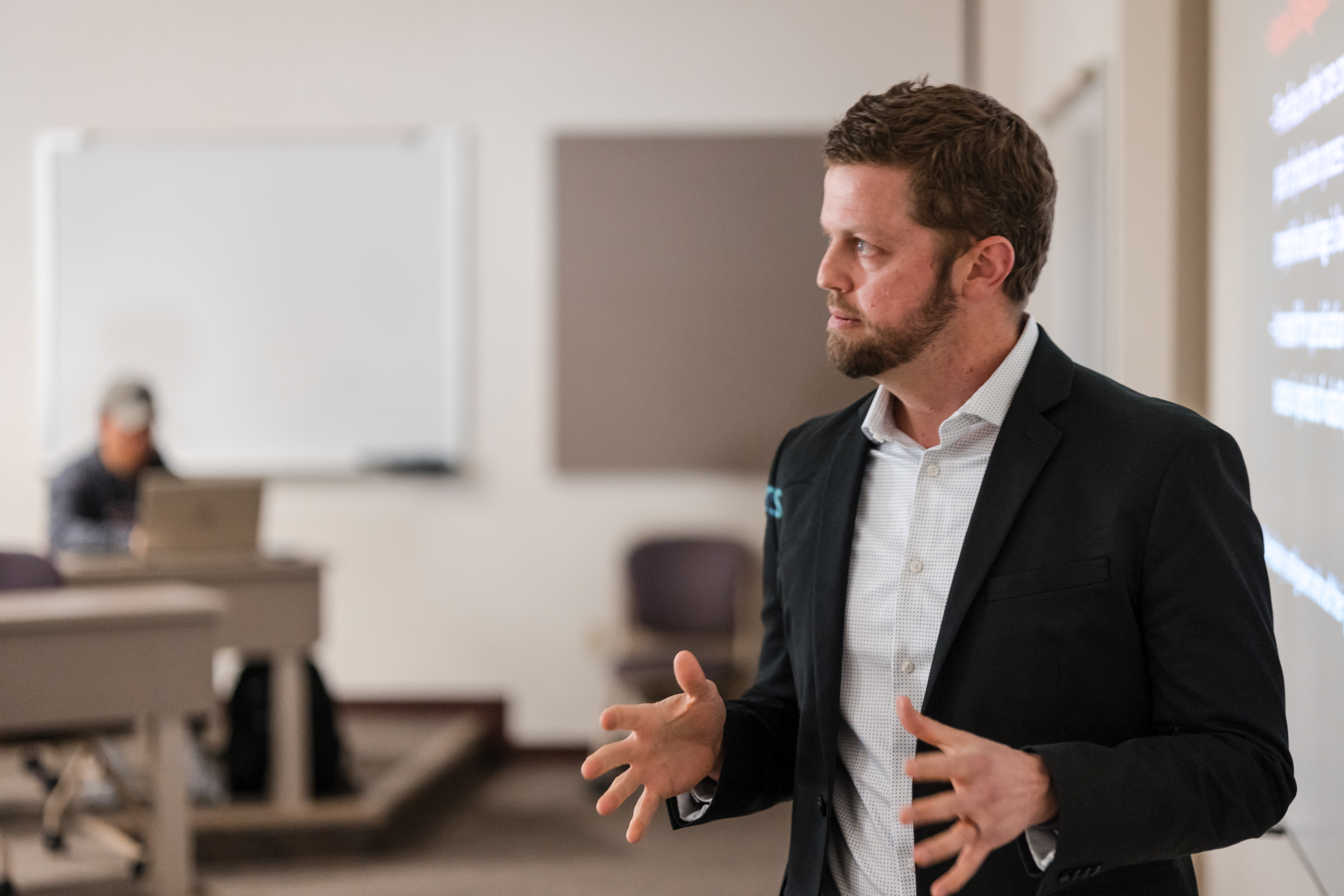 Scharbauer Hall: Sean Crotty, Associate Professor in TCU's AddRan College of Liberal Arts leads a Geography of Beer and Wine class. Photo by James Anger on March 24, 2022.