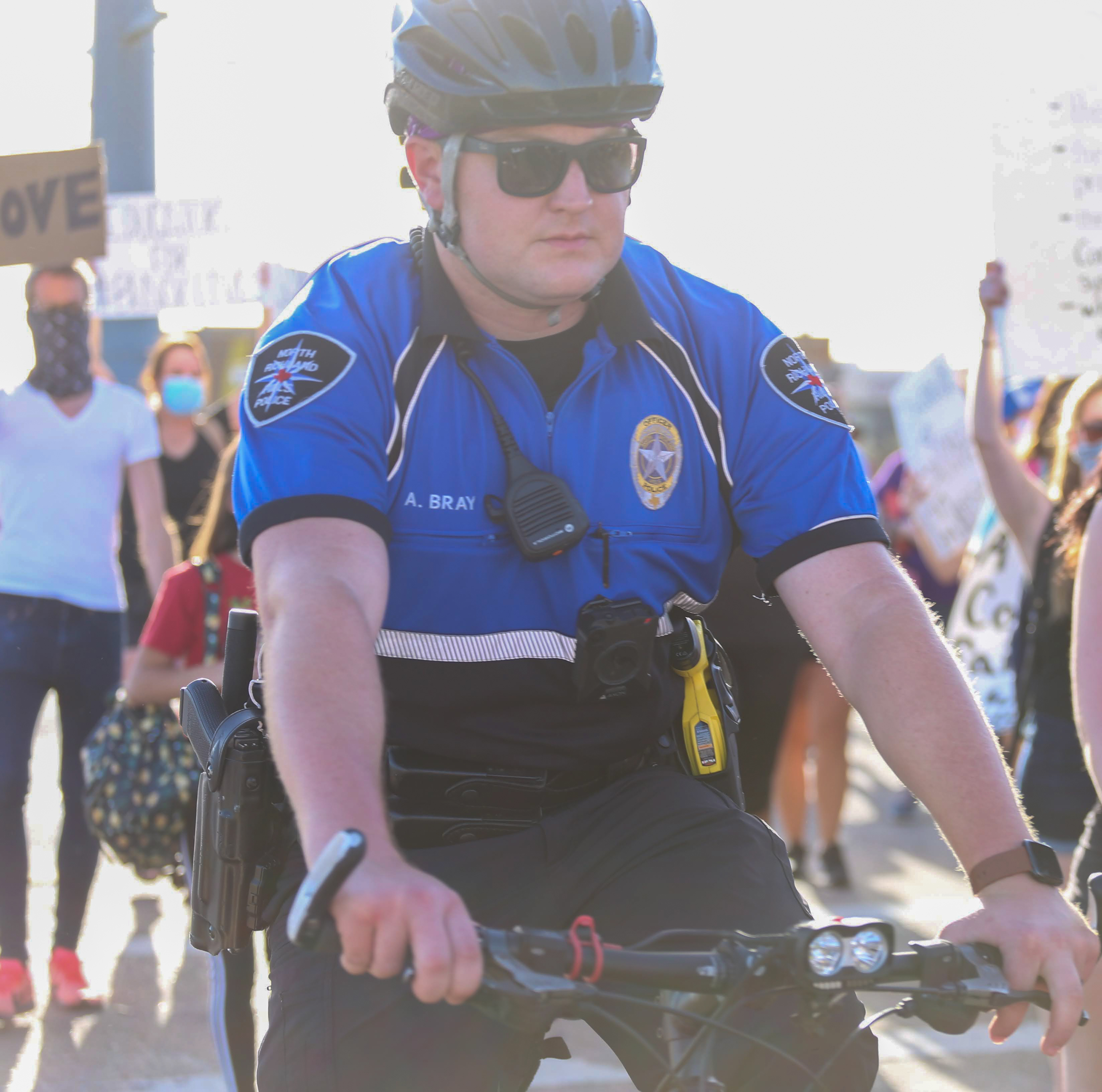 Andrew Bray escorts protesters during a march in 2020. Credit Andrew Bray