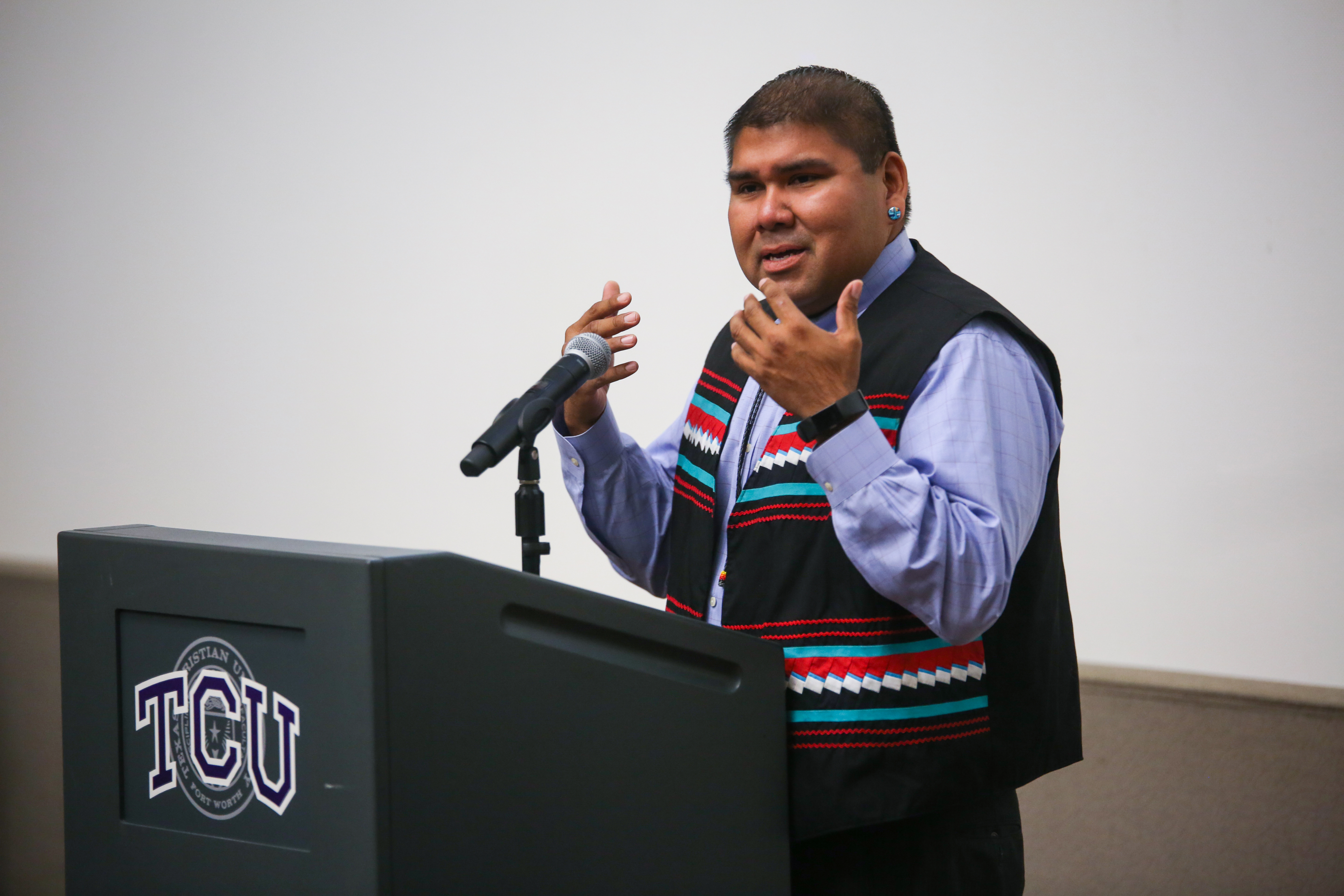 Seminole Nation member Chebon Kernell speaks at the dedication ceremony for TCU's Native American monument, October 15, 2018. Kernell serves as Executive Secretary of the United Methodist Church's Native American Ministries. Photo by Amy Peterson