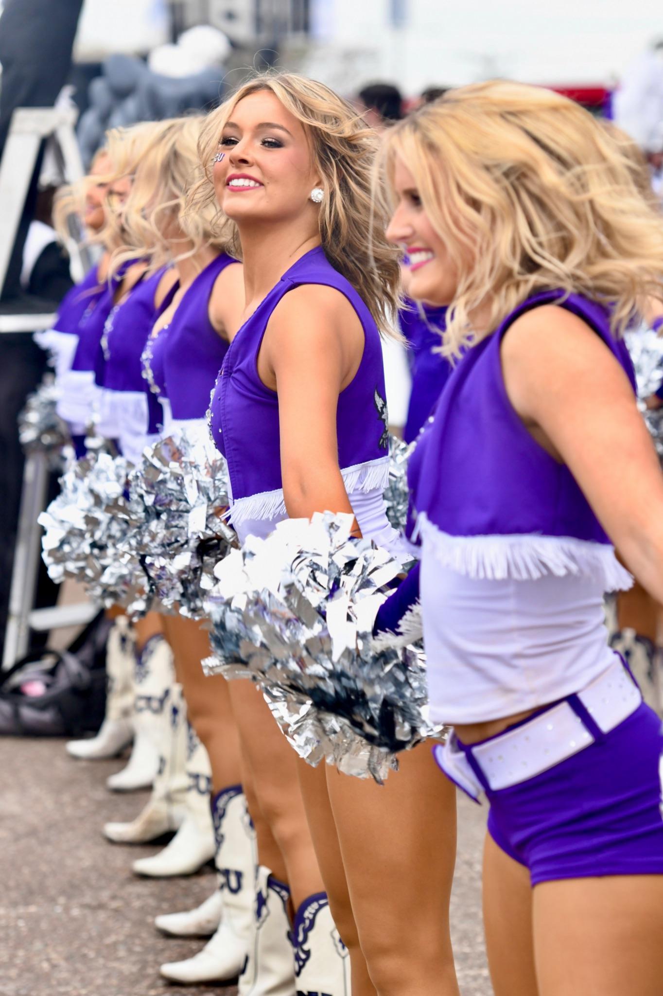 Trinity Miles dancing with TCU Showgirls. 