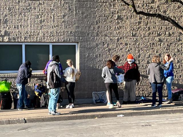 TCU students and local volunteers survey unsheltered homeless residents of Fort Worth's Lancaster Avenue area. Photo credit: Brie Diamond