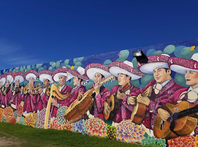 “Convivio (coexist): Murals of Community and Inclusion,” by Fort Worth artist Arnoldo Hurtado, depicting North Side High School's famous Mariachi Espuelas de Plata. Credit Arnoldo Hurtado.