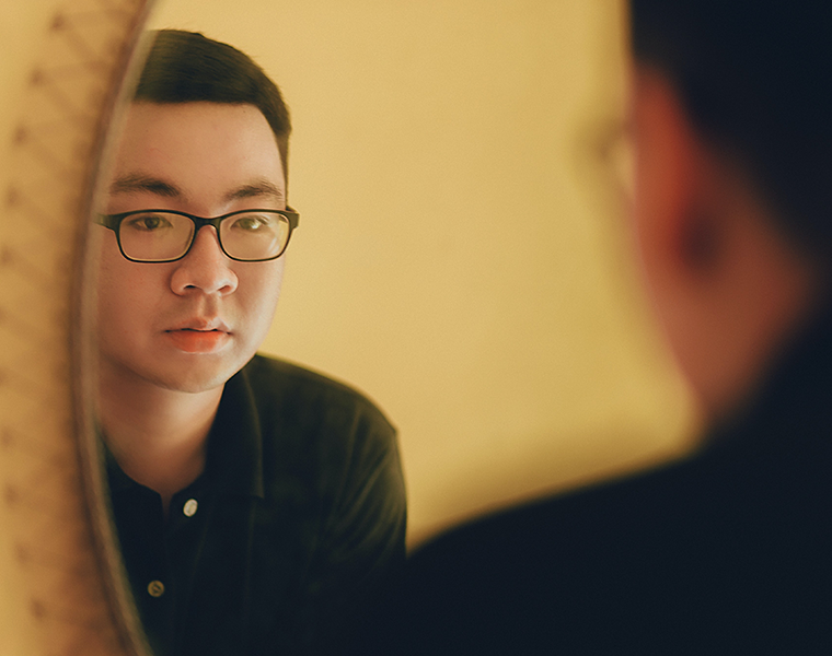 Photo of Man Looking at the Mirror. Credit Pexels | Min An 