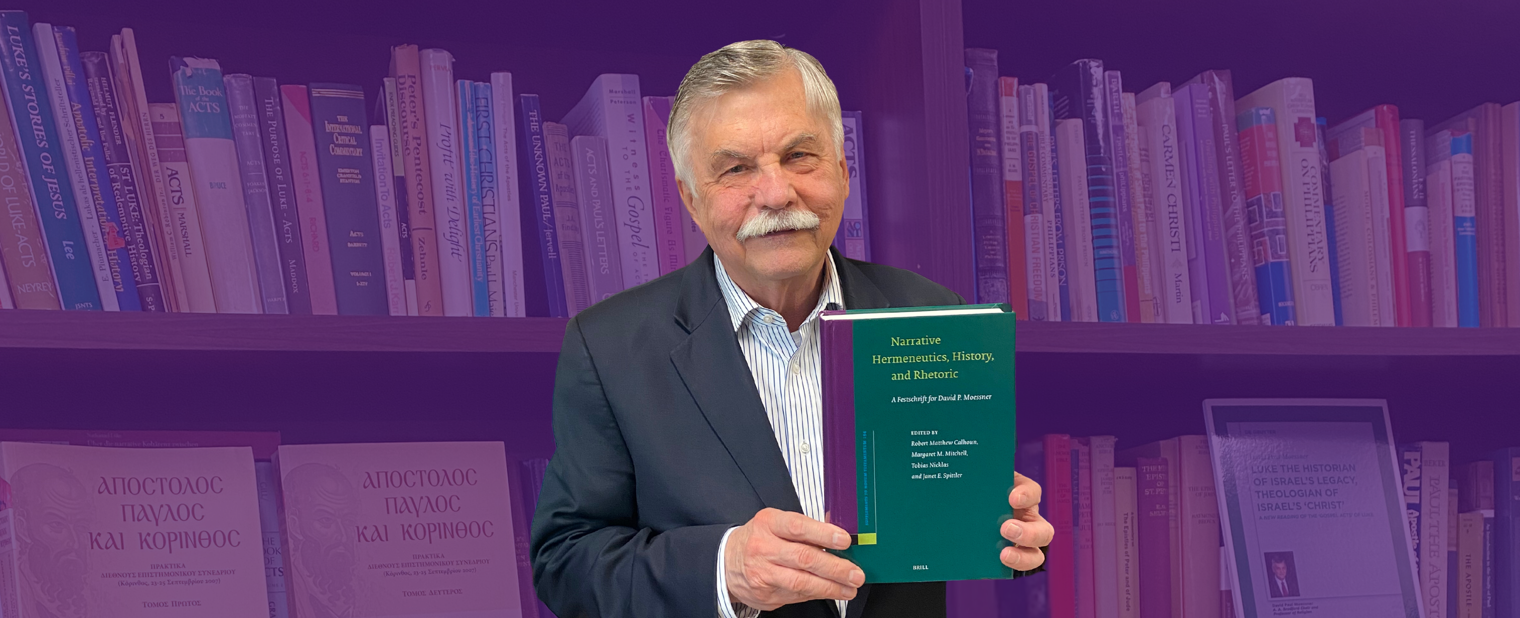 Professor David Moessner holds his Festschrift for a picture.