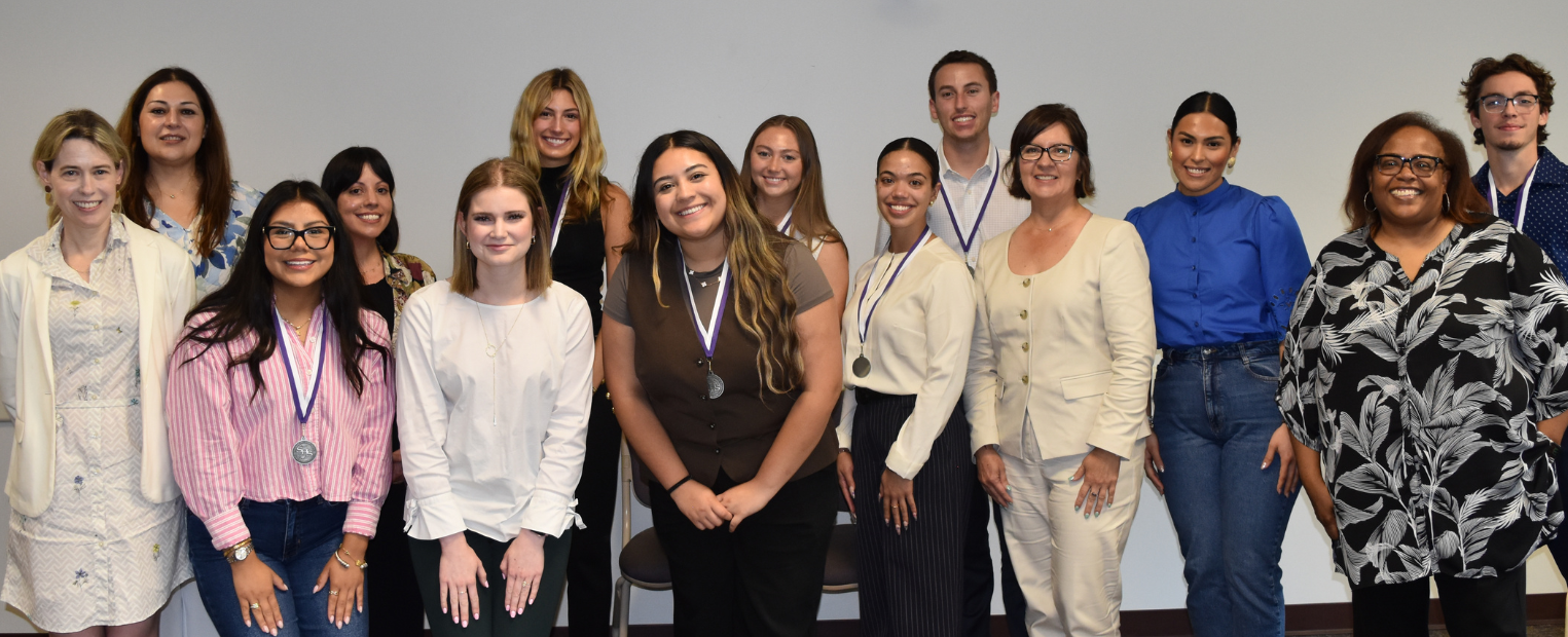 Spanish internship students at TCU in a group picture.