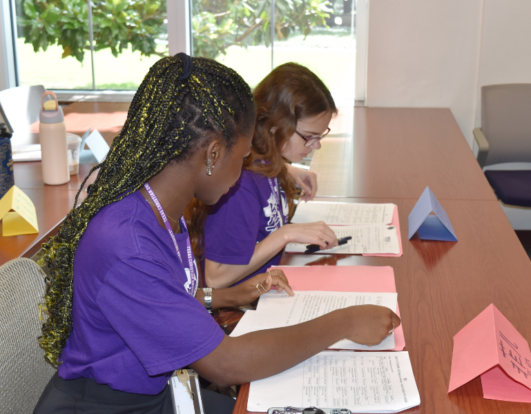 Two students working on a project at TCU's STARTALK camp.