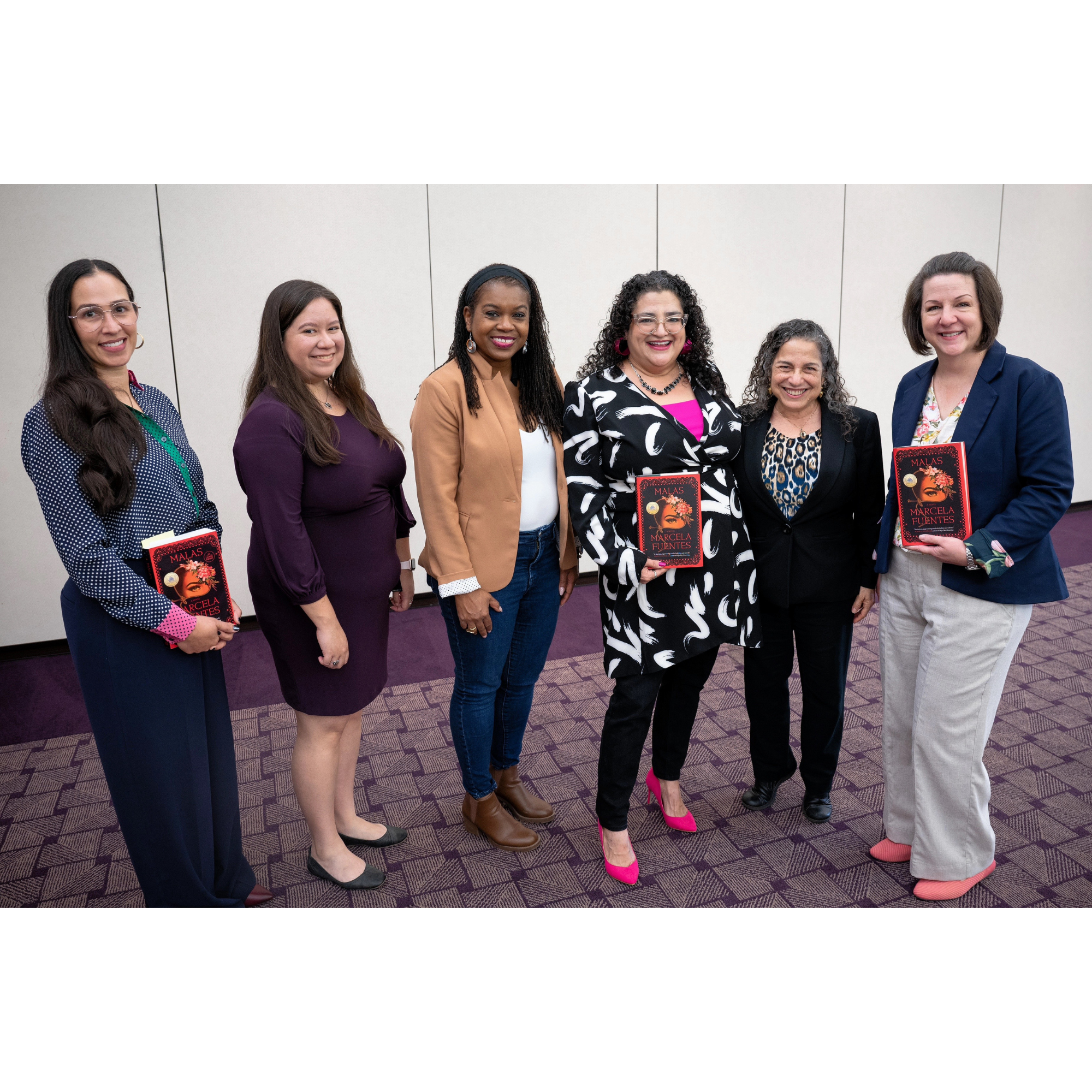 Marcela Fuentes with panel speakers